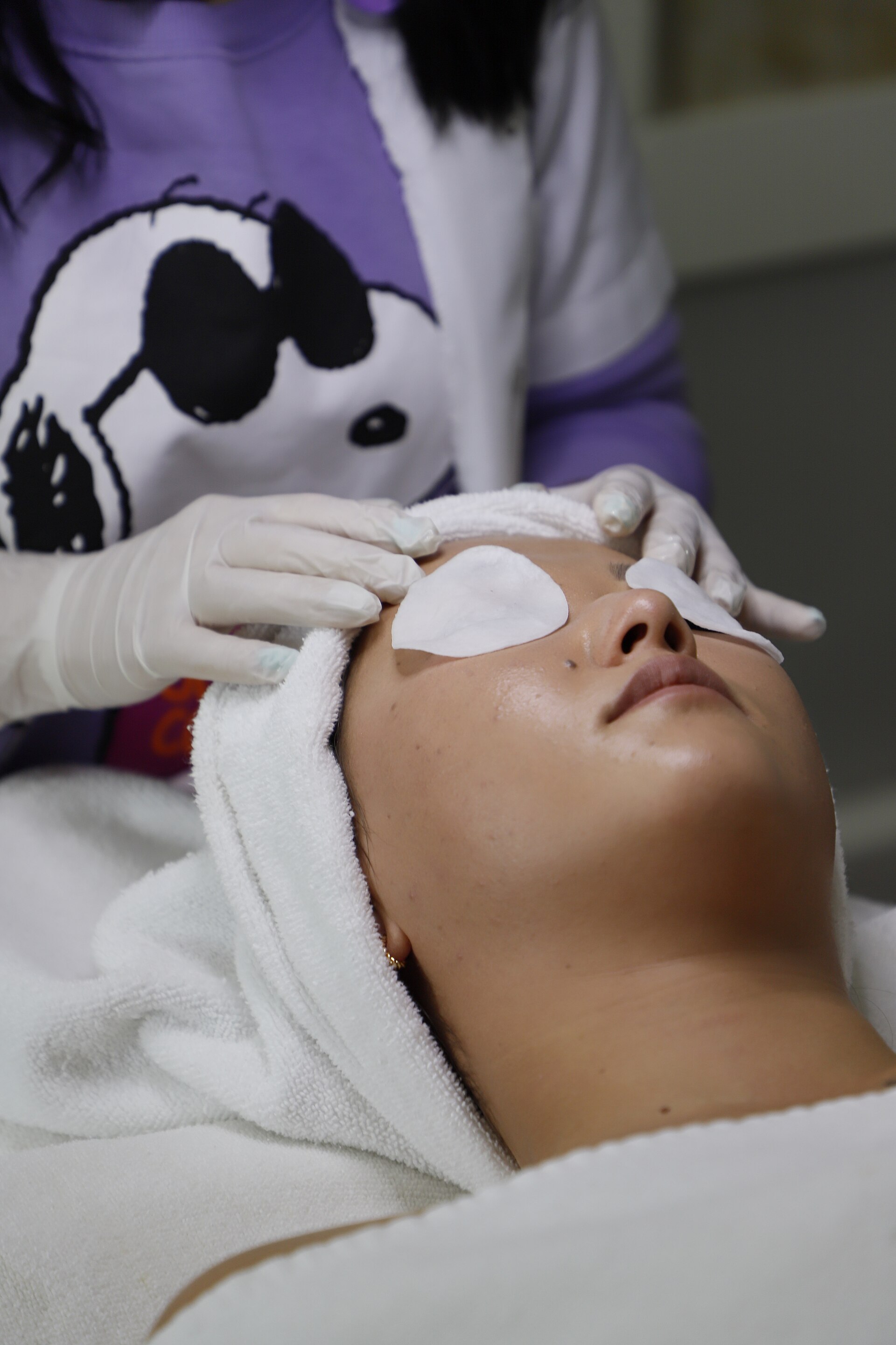 Client receiving a clinical facial